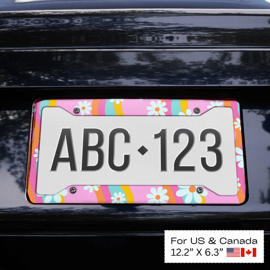 Pink Groovy Flowers License Plate Frame fitted on a car (view 3)