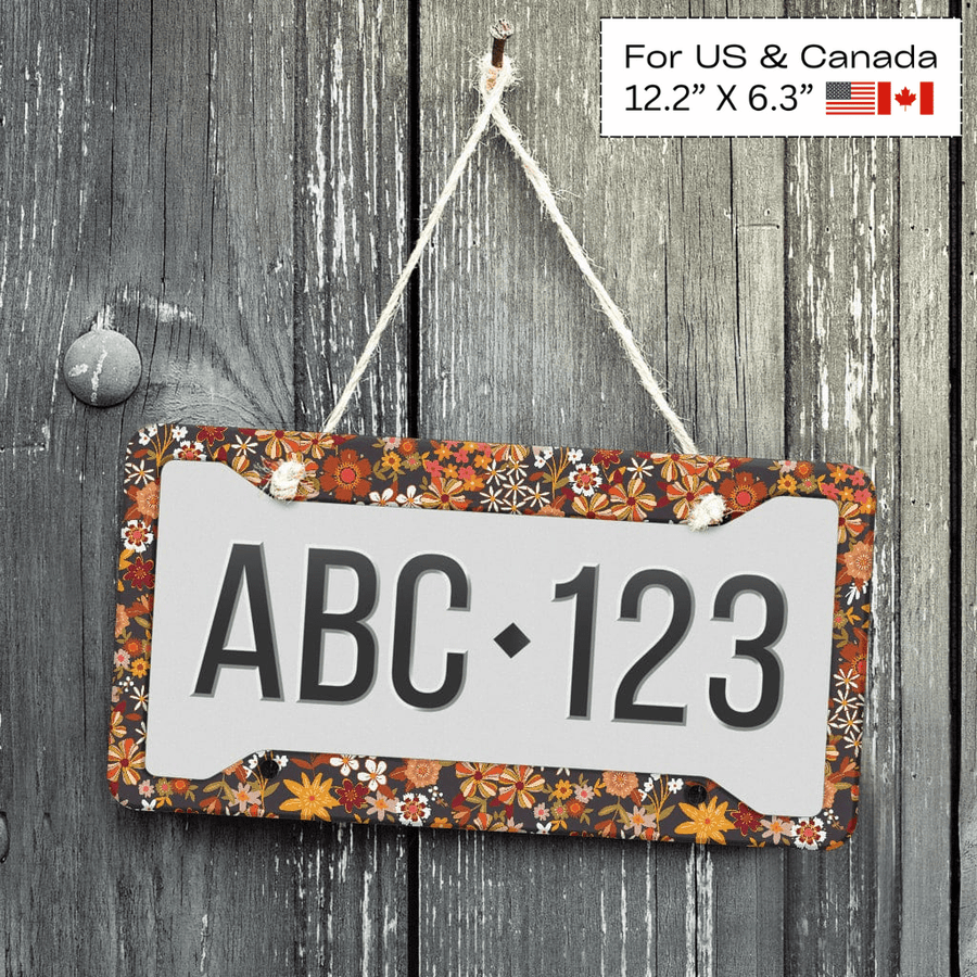 Bohemian Dream License Plate Frame displayed on a wooden wall