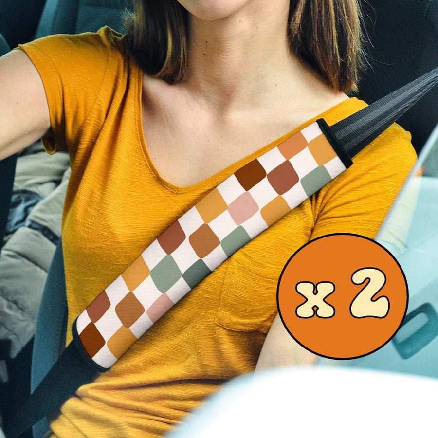 Boho Checkered Seat Belt Covers (Set of 2) on a car seat belt