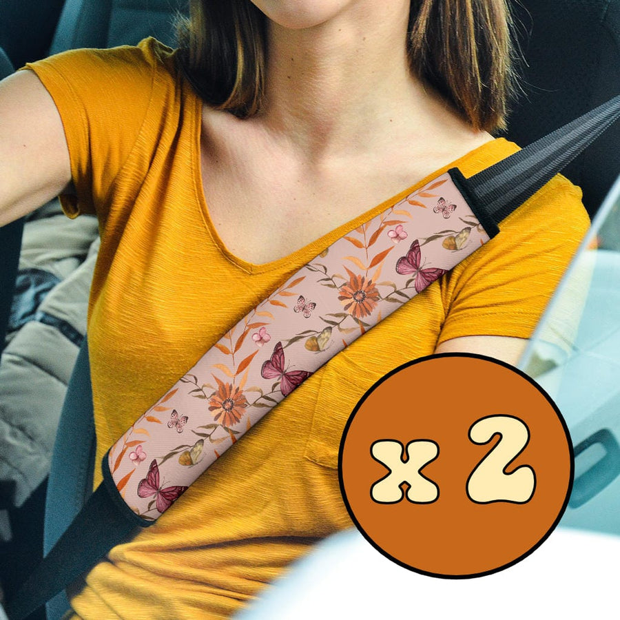 Pink Butterflies Seat Belt Covers (Set of 2) on a car seat belt