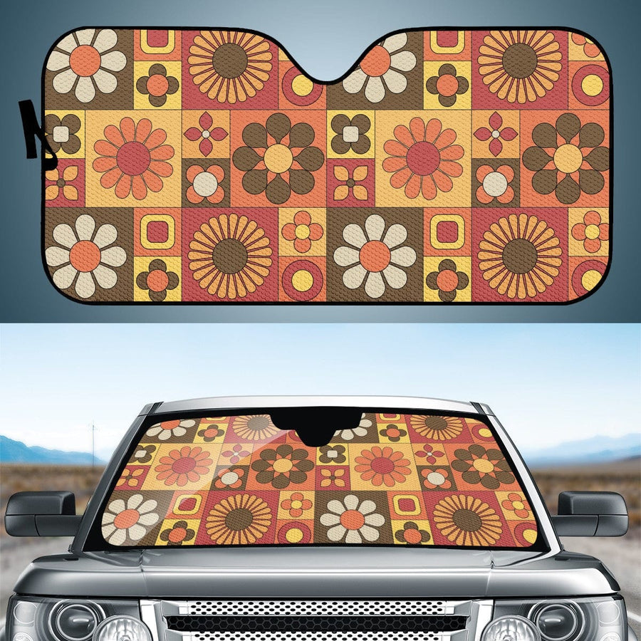 Orange Mod Daisy Car Shade open and fitted in a car windscreen