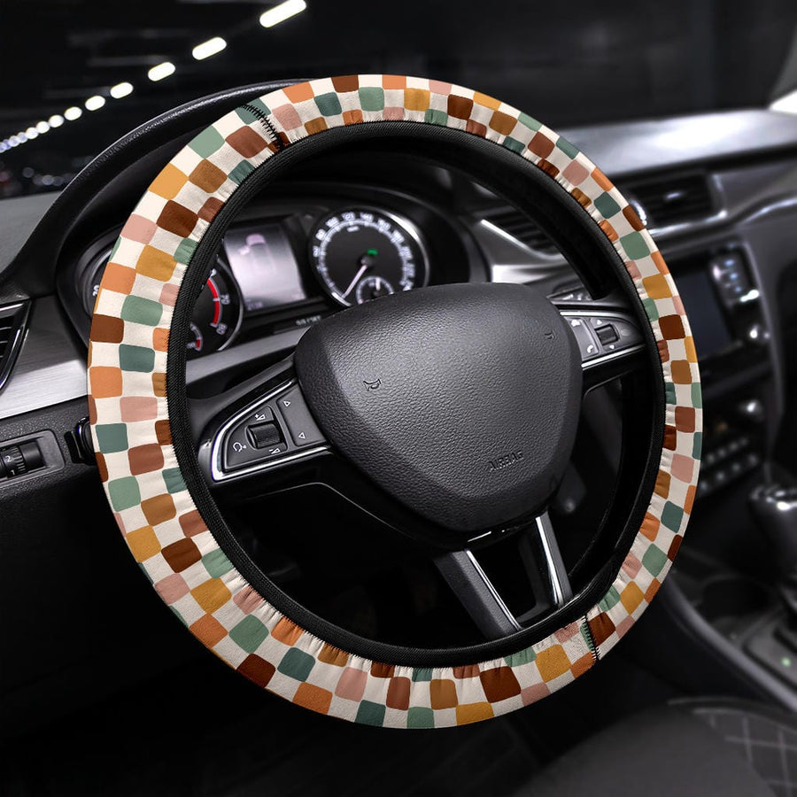 Boho Checkered Steering Wheel Covers fitted on a steering wheel