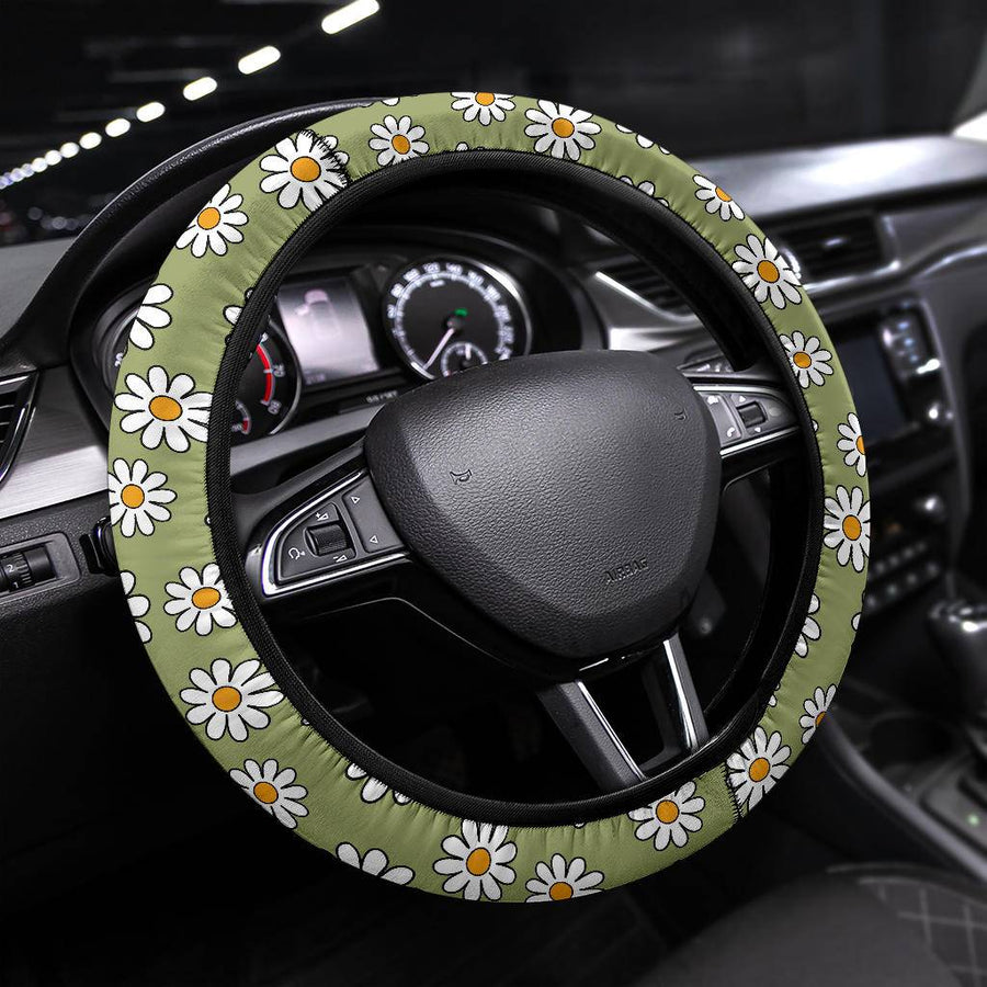 Sage Green Daisy Steering Wheel Covers fitted on a car steering wheel