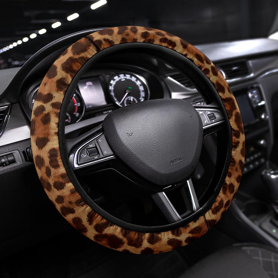 Leopard Steering Wheel Covers fitted on a steering wheel