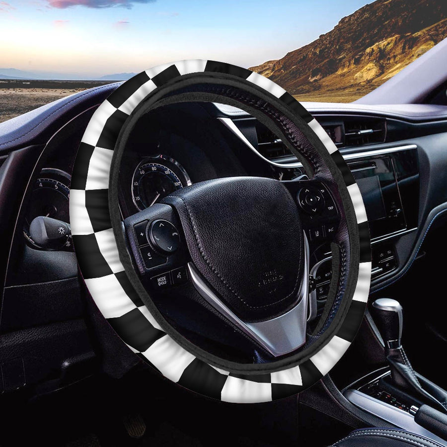 Wavy Black and White Checkered Steering Wheel Covers fitted on a car steering wheel