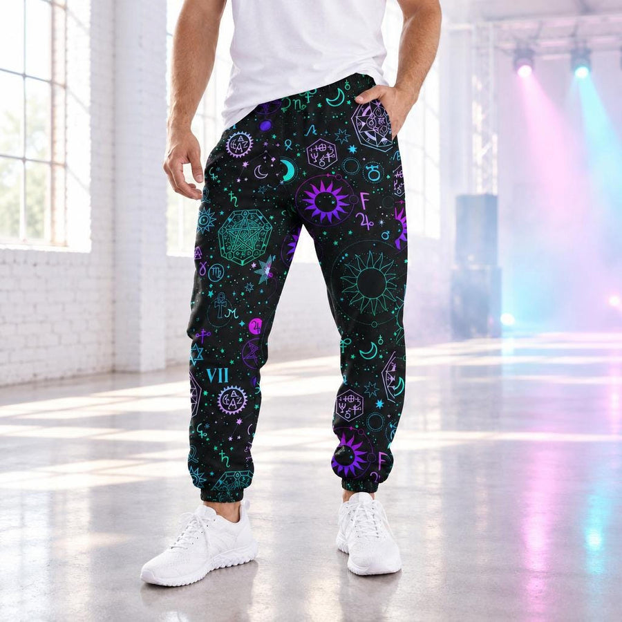 Celestial Men's Track Pants worn with white sneakers in a bright daytime warehouse rave space with pastel stage lights