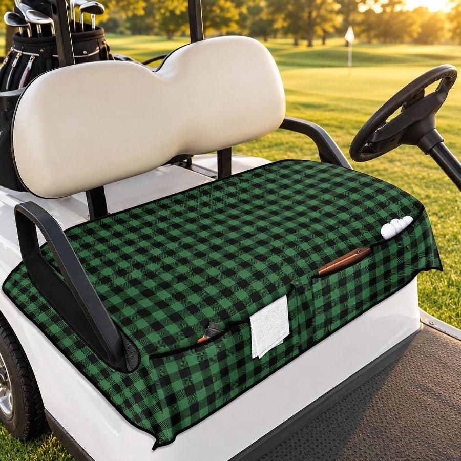 Green Plaid Golf Cart Seat Cover with front pockets, fitted on a white golf cart on a fairway