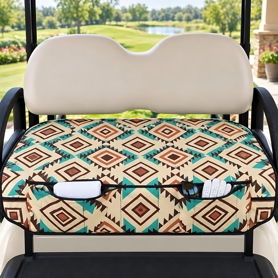 Western Aztec Golf Cart Seat Cover with front pockets, fitted on a white golf cart on a fairway