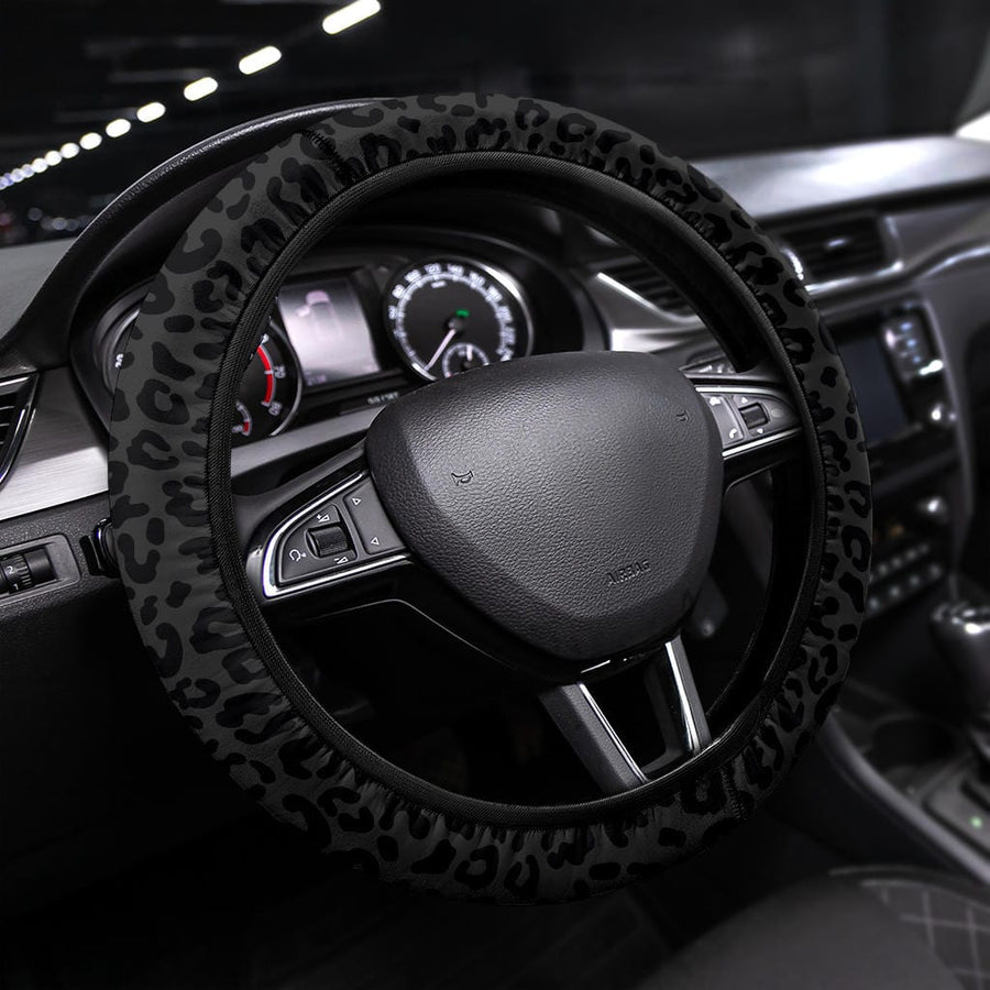 Black Leopard Steering Wheel Covers fitted on a steering wheel