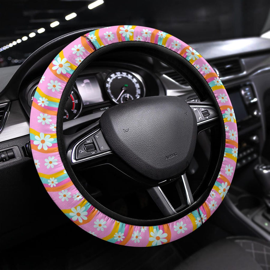 Pink Groovy Flowers Steering Wheel Covers fitted on a steering wheel
