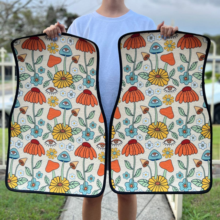 Hippie Mushroom Love Car Floor Mats held up to show the print