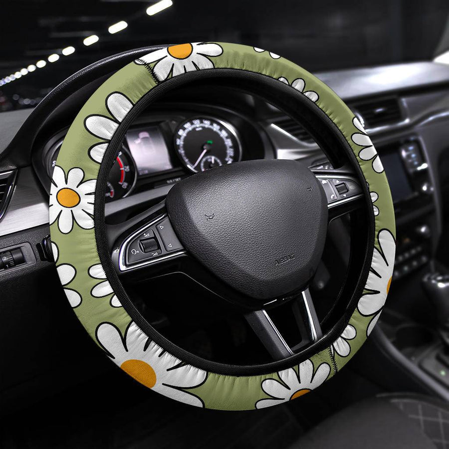 Sage Green Daisy II Steering Wheel Covers fitted on a steering wheel