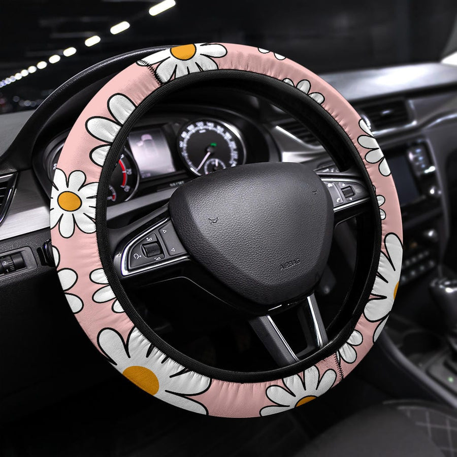 Pink Daisy Steering Wheel Covers fitted on a steering wheel