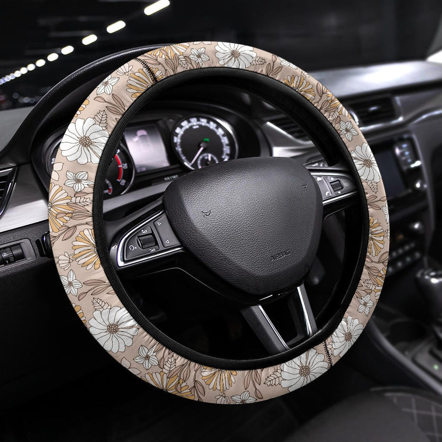 Creamy Flowers Steering Wheel Covers fitted on a steering wheel