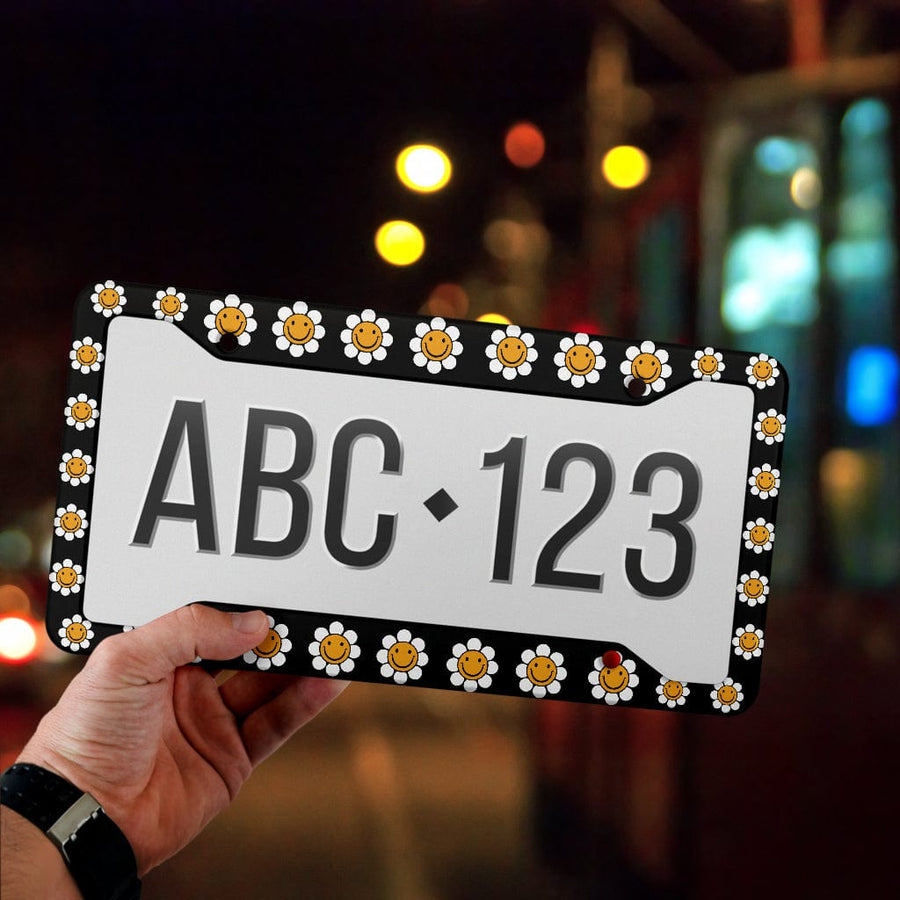 Black Smiling Faces License Plate Frame on its own