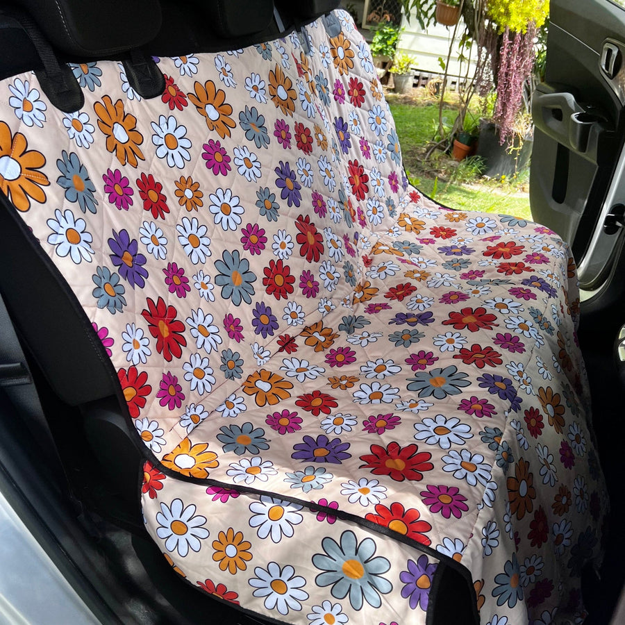 Boho Hippie Daisies Dog Car Seat Covers fitted across a car back seat