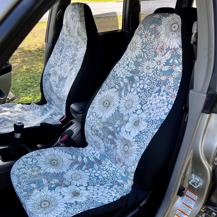 Snowy Field Of Flowers Faux Suede Car Seat Covers (Set of 2) fitted on car seats